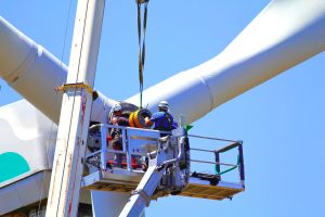 Wind turbine engineers carrying out maintenance